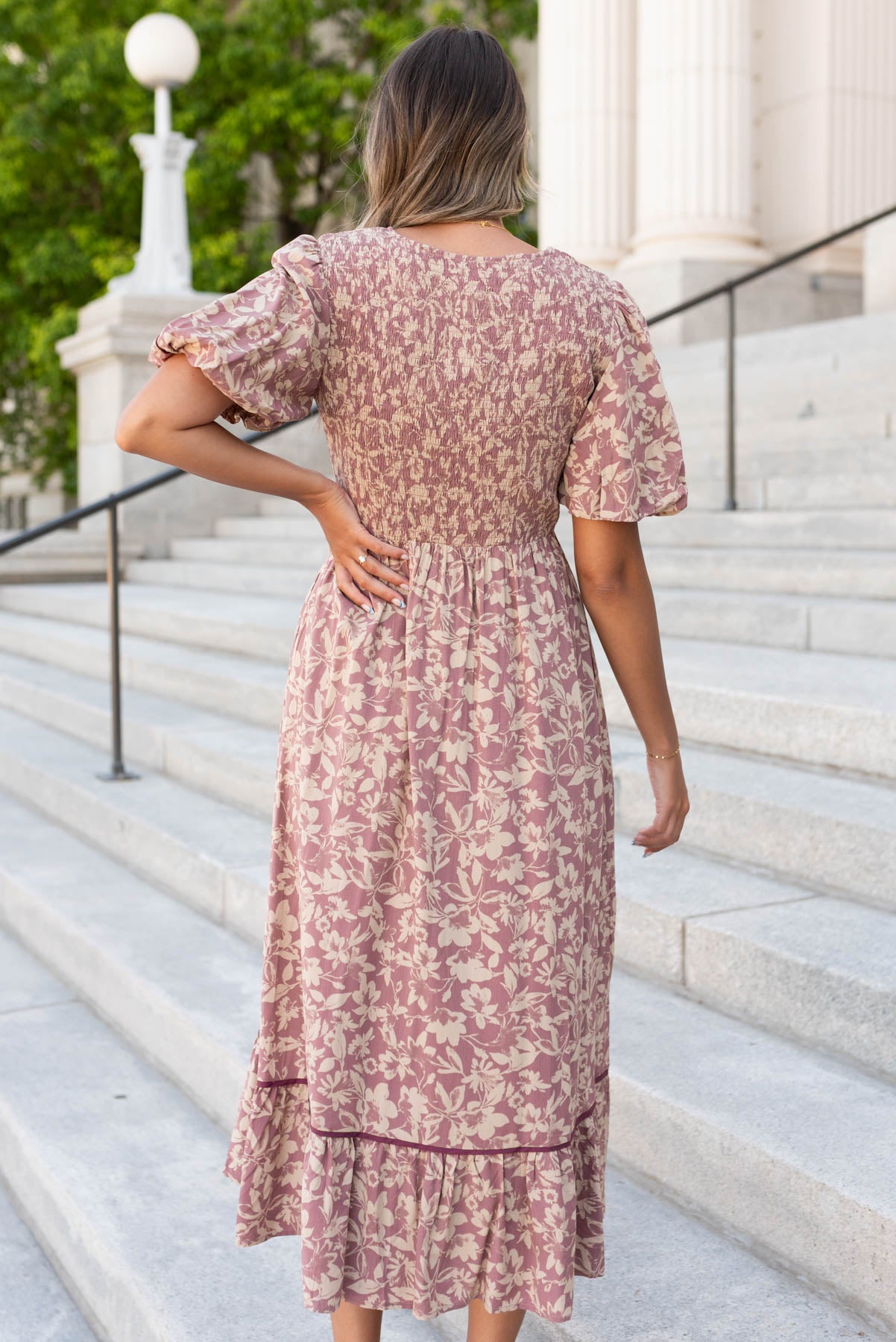 Back view of the dusty plum floral dress