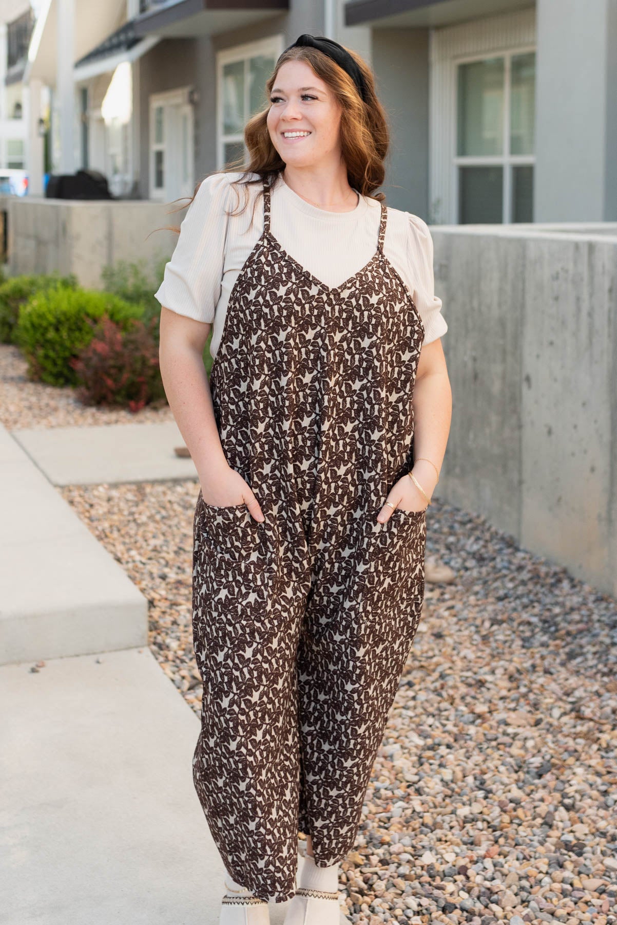 Front view of the plus size tuape knit jumper with front pockets