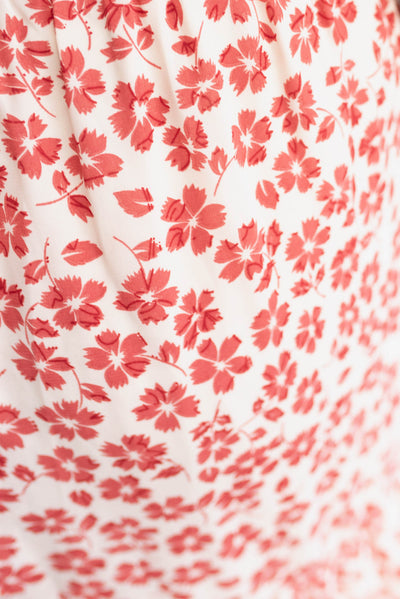 Close up of the fabric on the maroon floral skirt