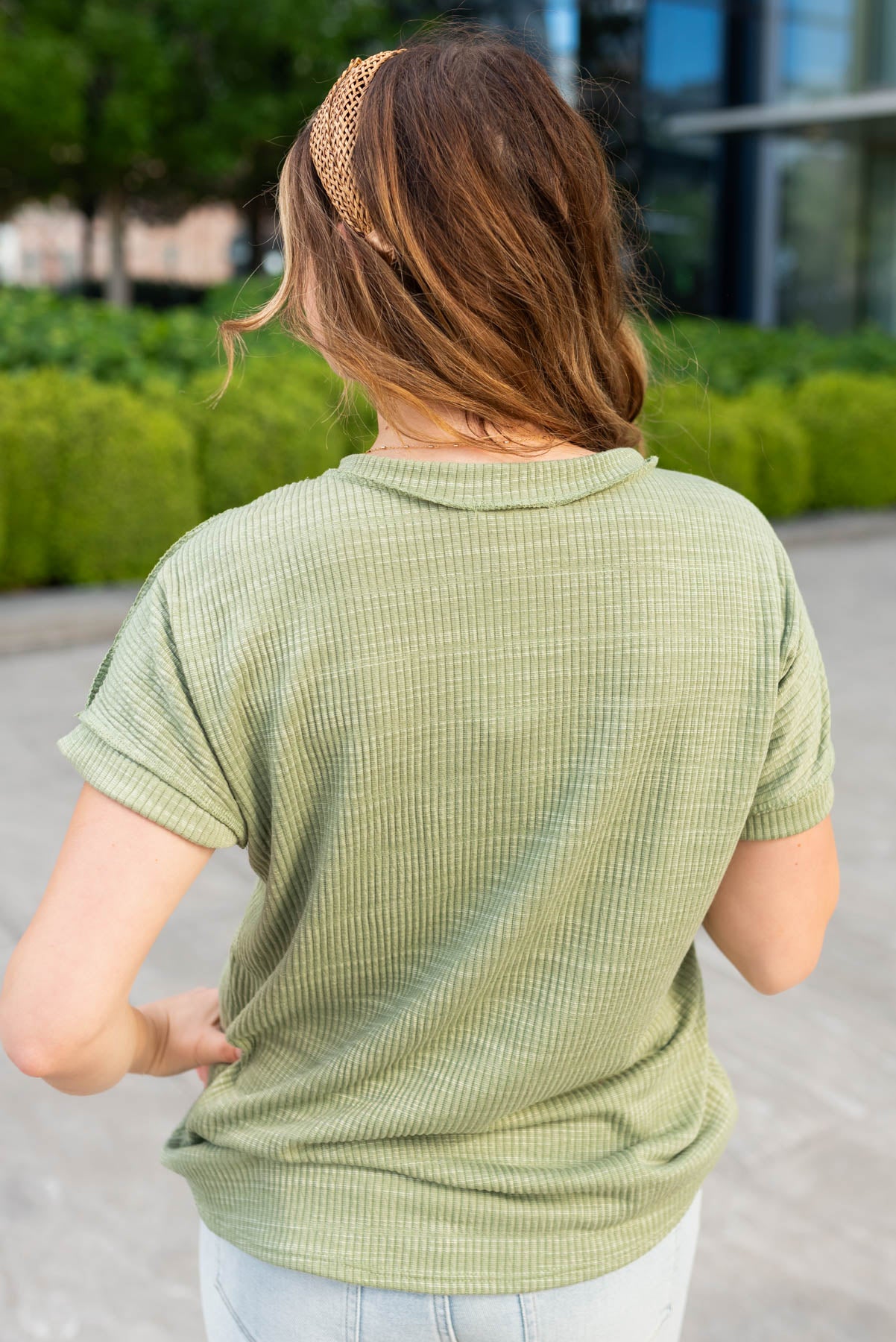 Back view of the the olive textrued top