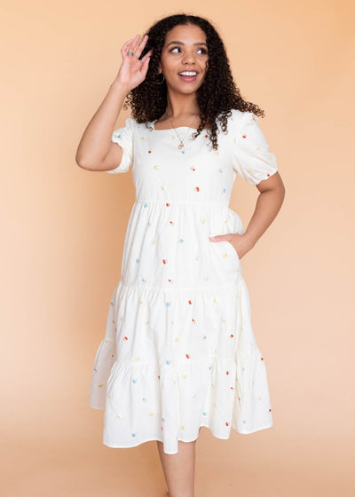 Puff sleeves on the cream floral embroidered dress