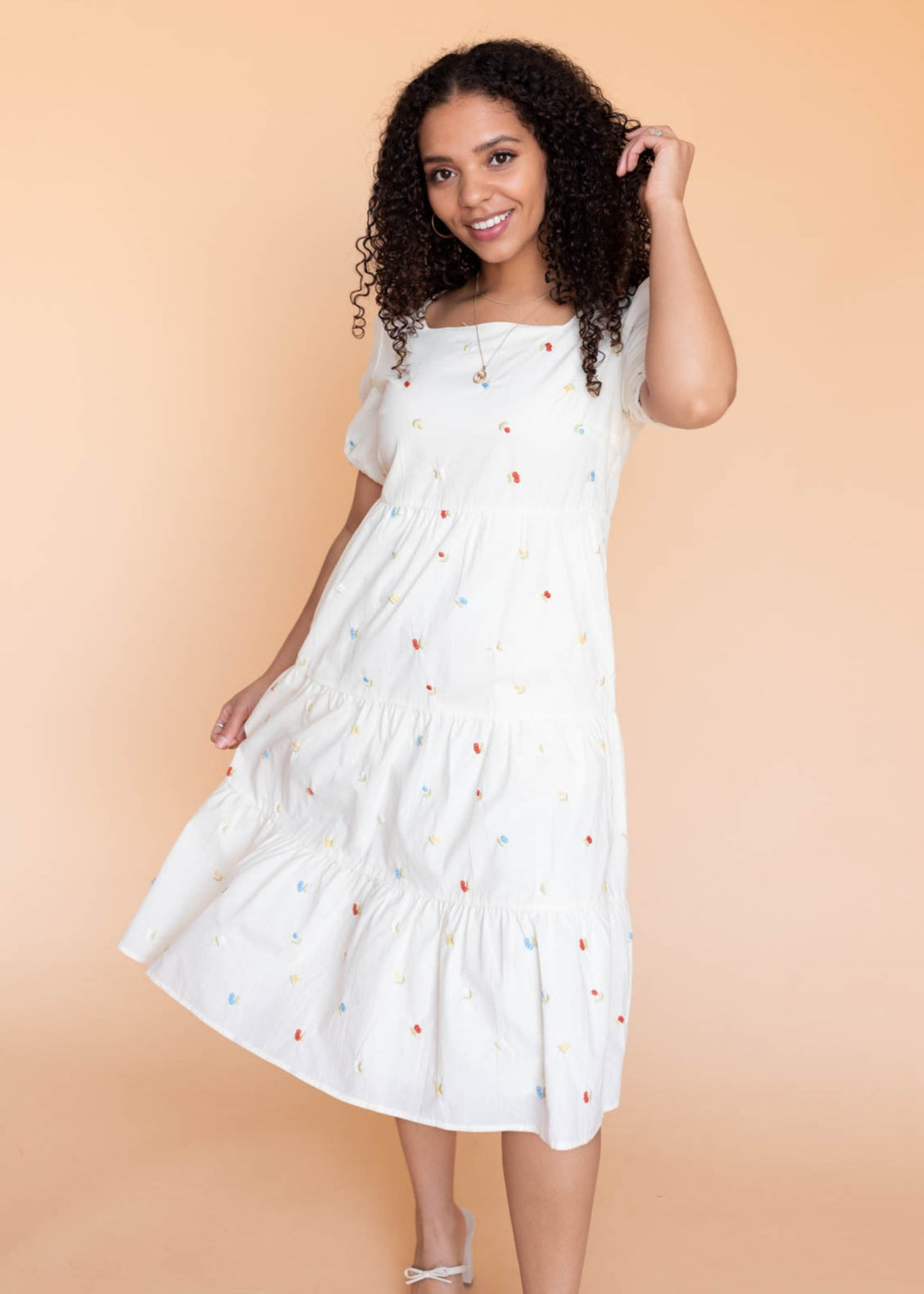 Cream floral floral embroidered dress with small pattern