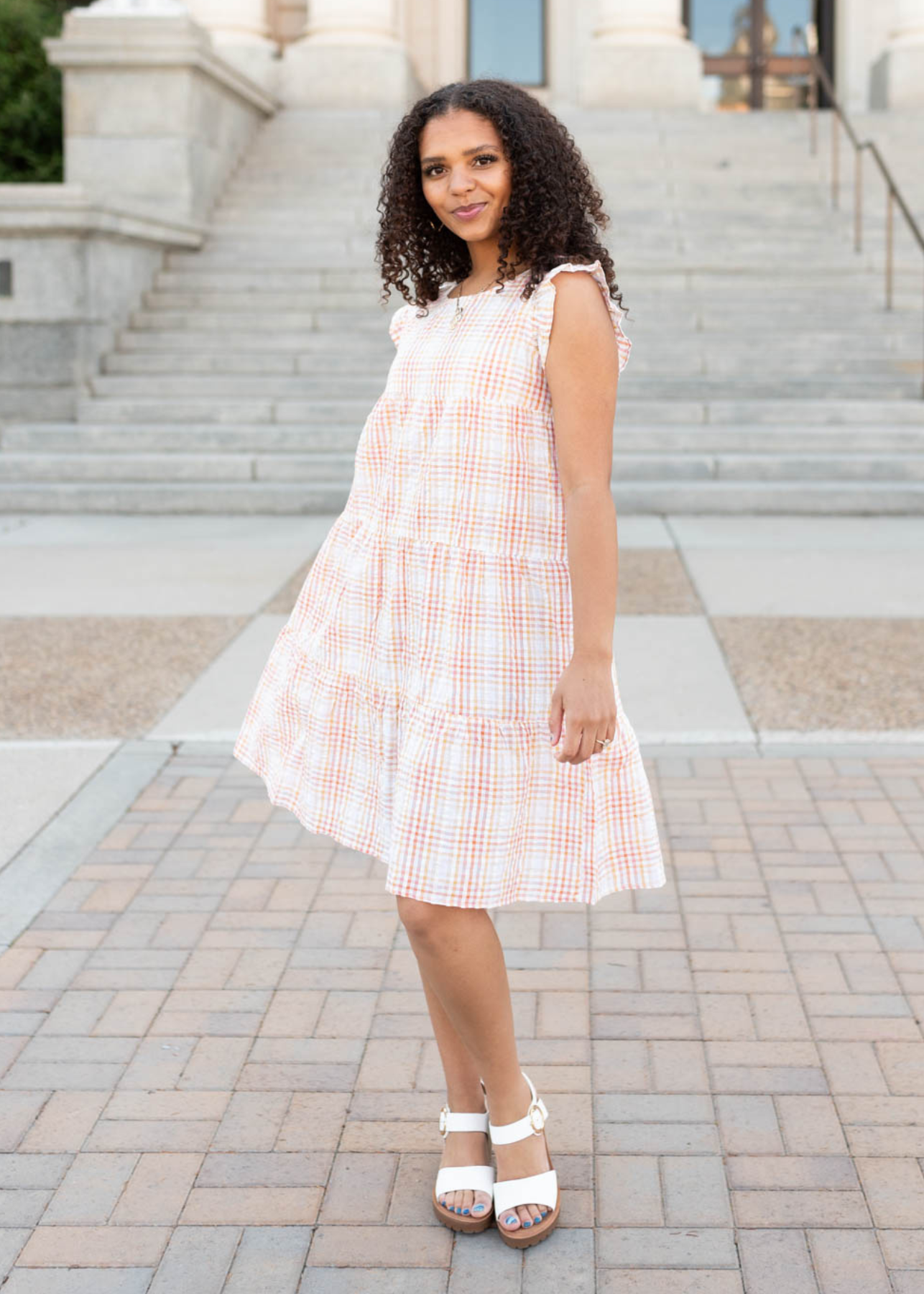 Sleeveless orange plaid mini dress