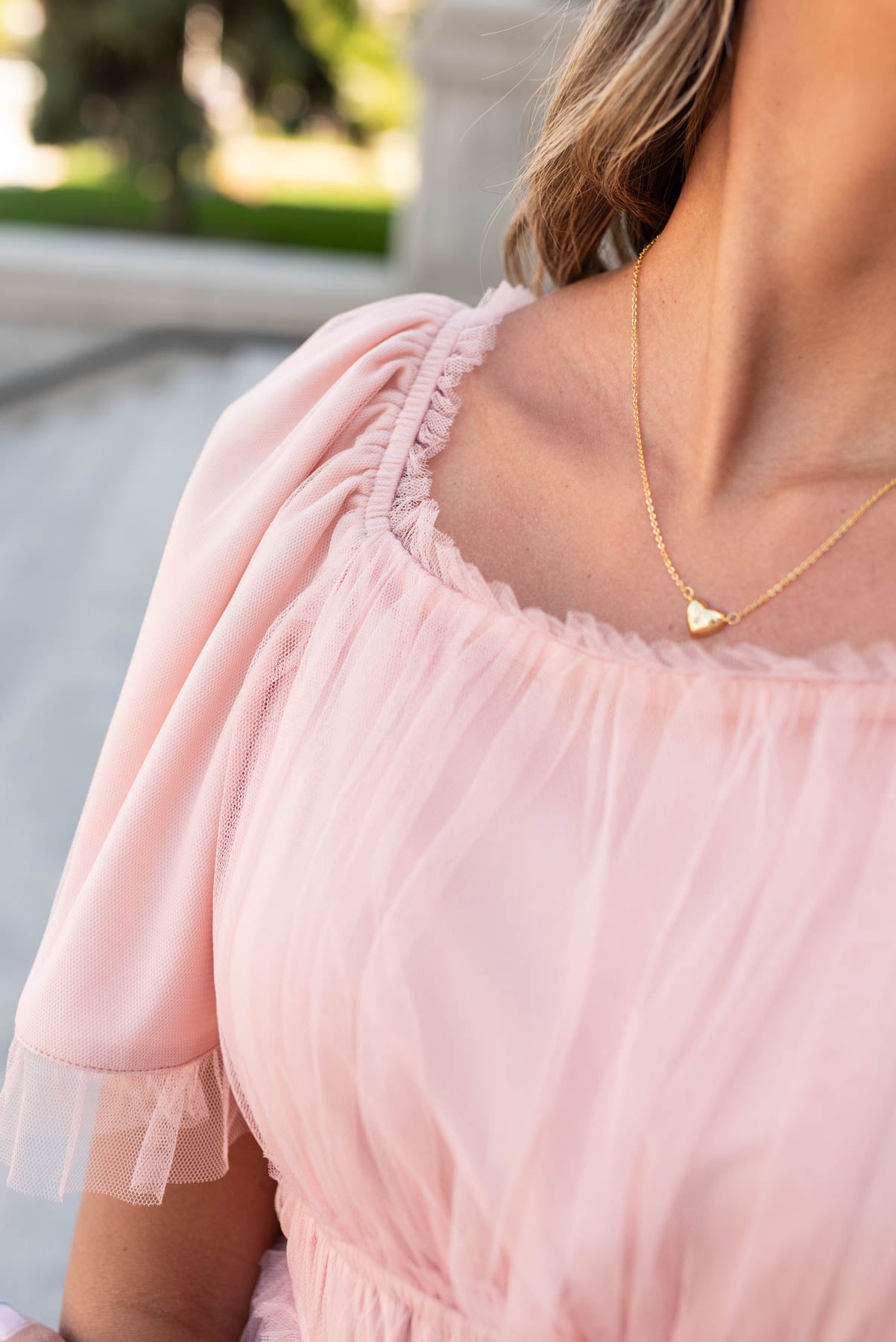 The square neck and fabric on the blush maxi dress