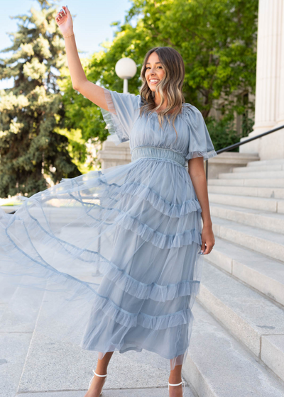 Dusty blue maxi dress with ruffle skirt and tulle fabric