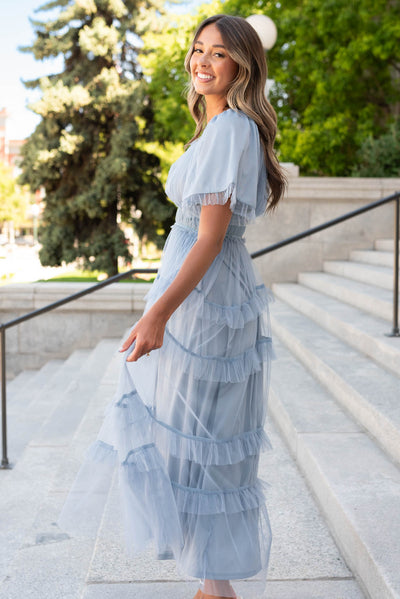 Side view of the dusty blue maxi dress