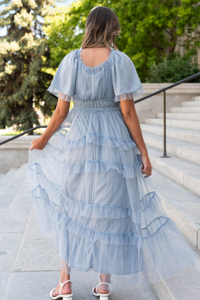 Back view of the dusty blue maxi dress