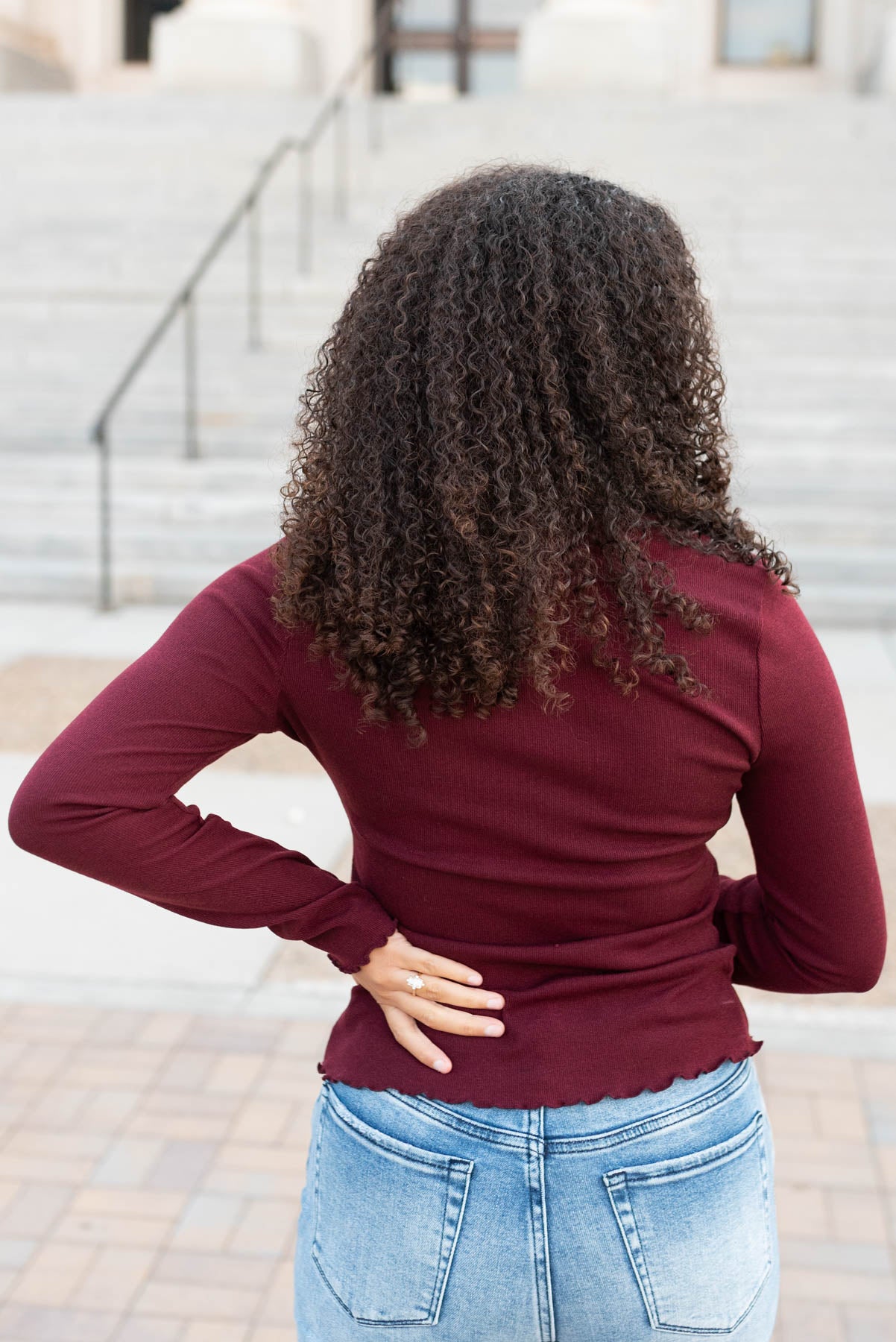 Back view of the burgundy ruffle ribbed top