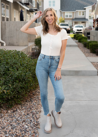 Cream bow bodysuit