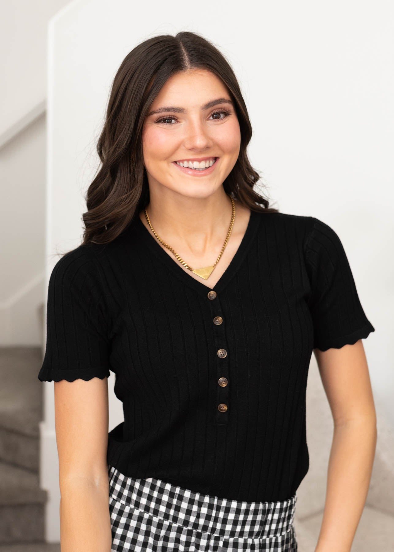 Short sleeve black button top