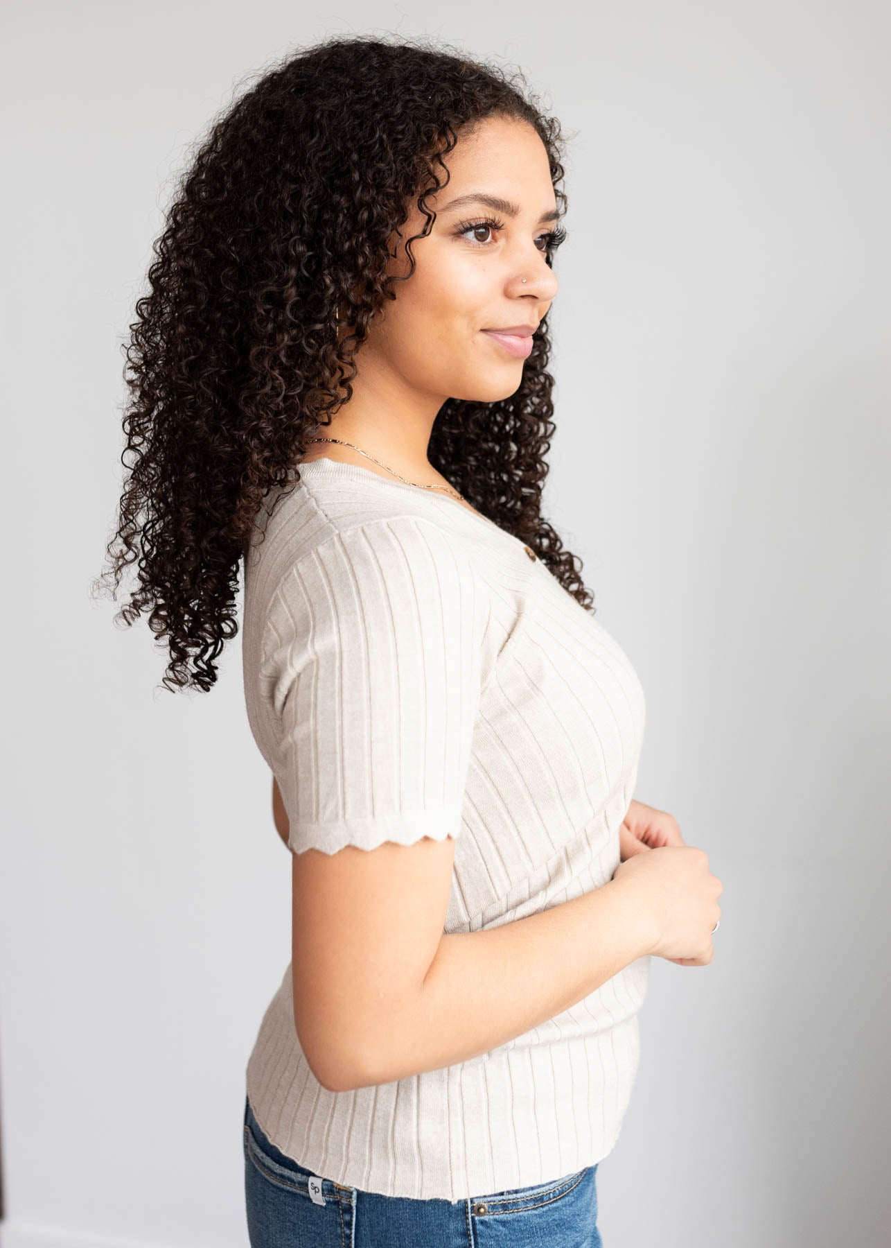 Side view of the oatmeal button down top