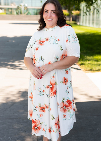 Plus size ivory floral midi dress with short sleeves