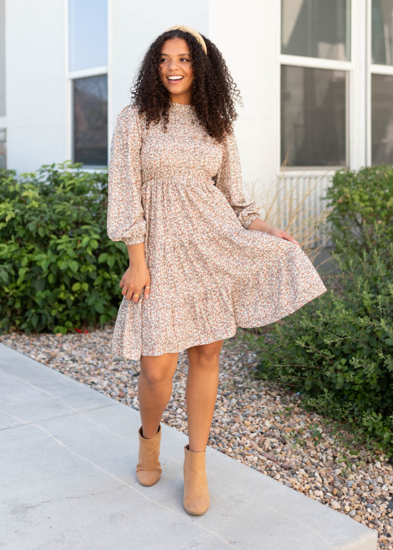 Beige floral smocked dress with a smocked bodice