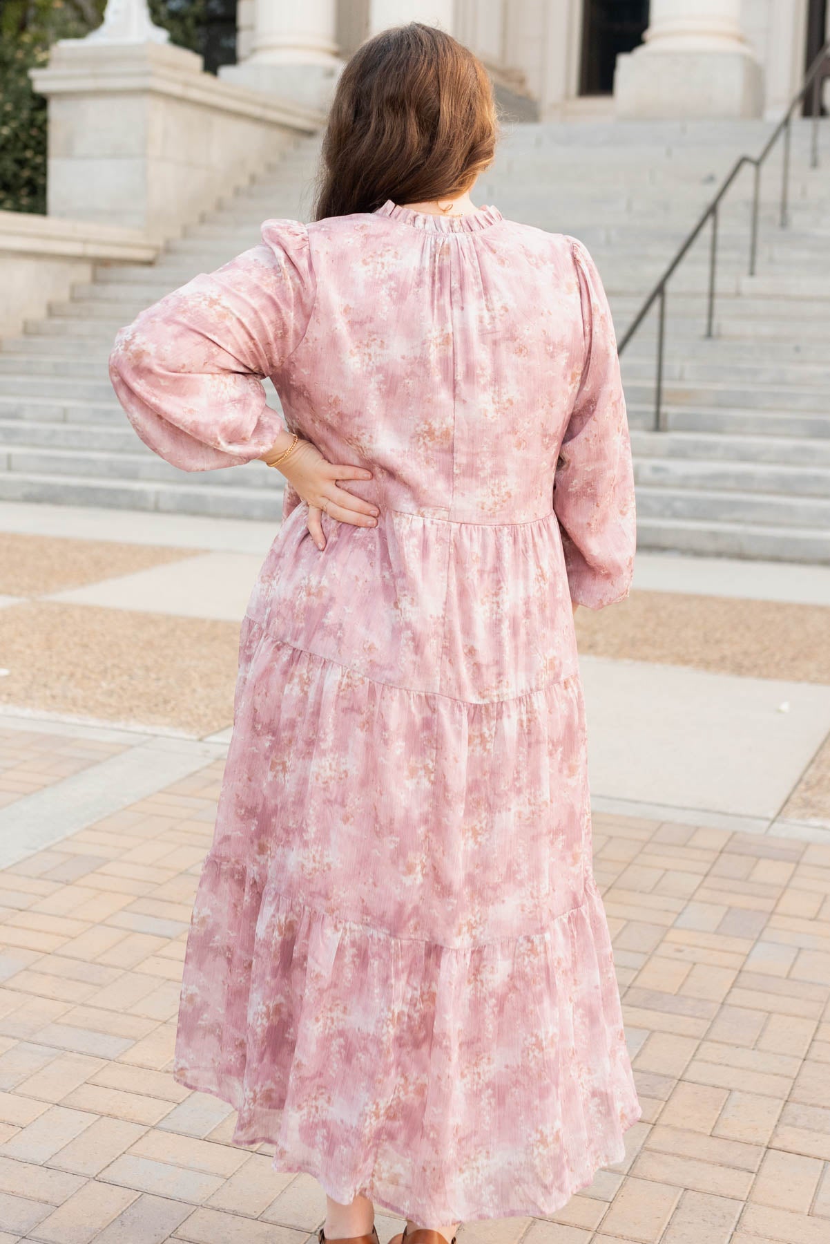 Back view of the plus size mauve floral tiered dress