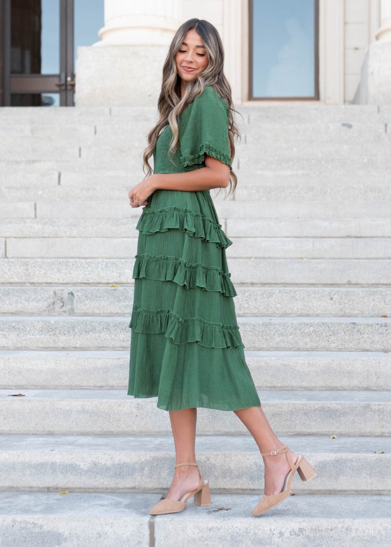 Side view of the green ruffle tiered dress