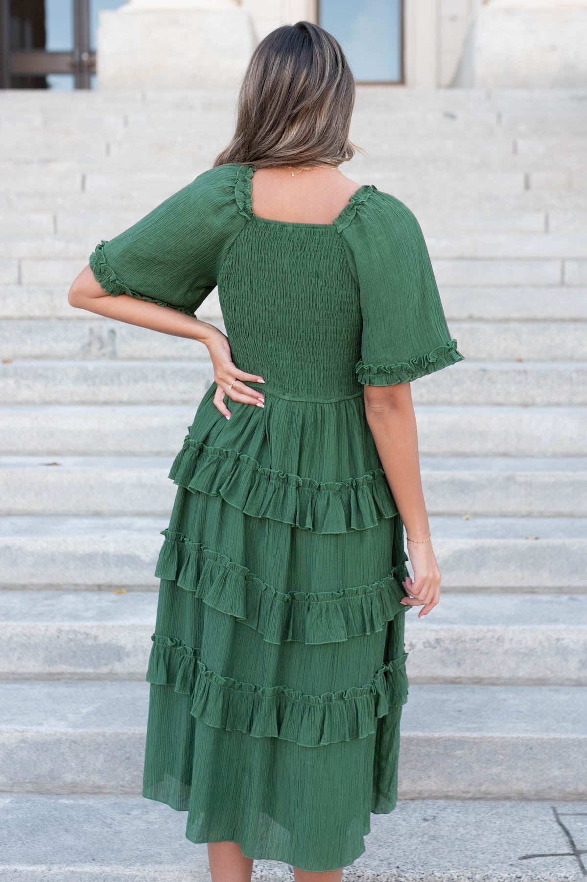 Back view of the small green ruffle tiered dress