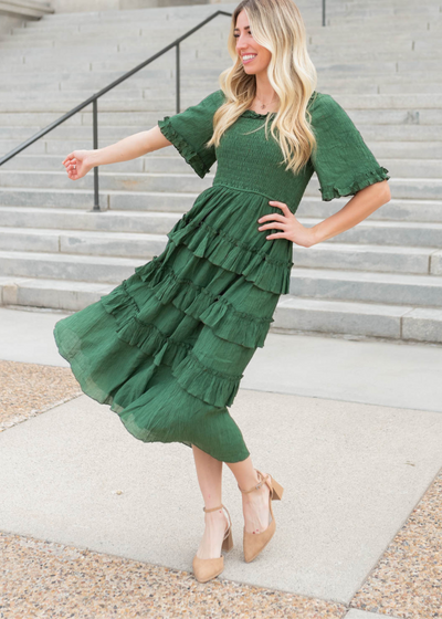 Green textured ruffle tiered dress with ruffles on skirt and sleeves