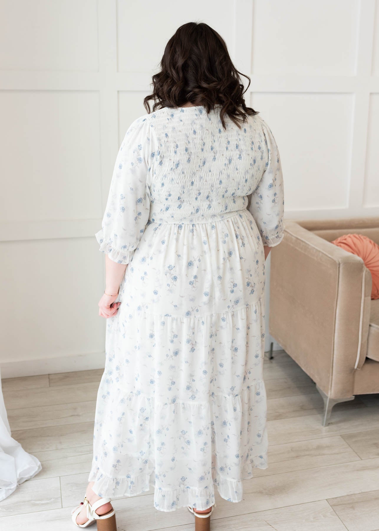 Back view of the light blue floral tiered dress in plus size