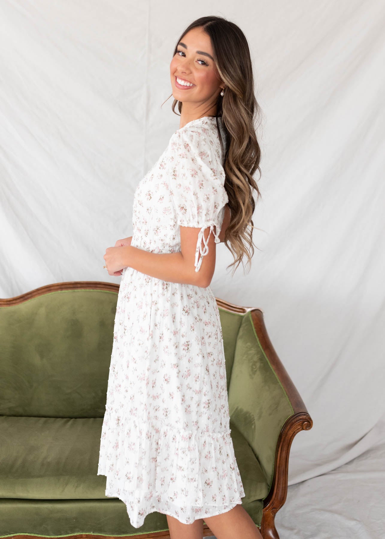 Side view of the ivory swiss dot floral dress