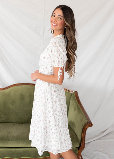 Side view of the ivory swiss dot floral dress