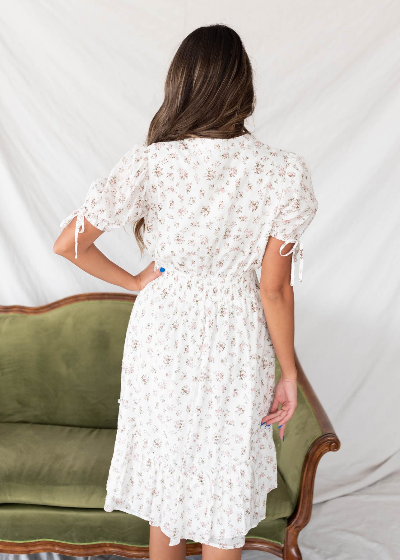 Back view of the ivory swiss dot floral dress