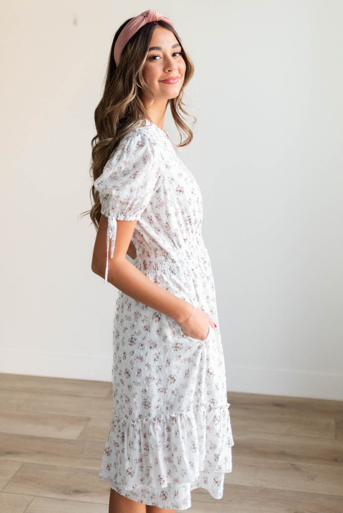 Side view of the ivory swiss dot floral dress