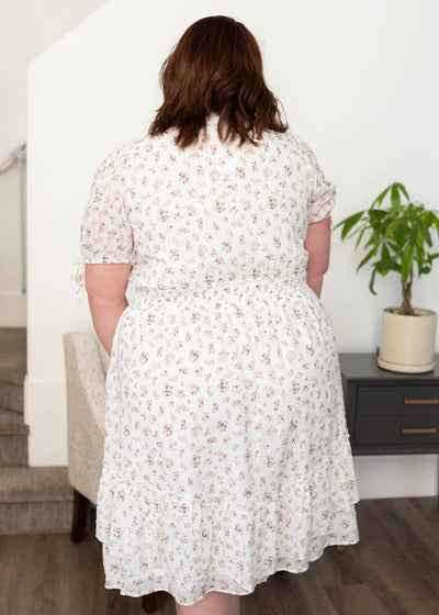 Back view of the plus size ivory swiss dot dress with elastic waist