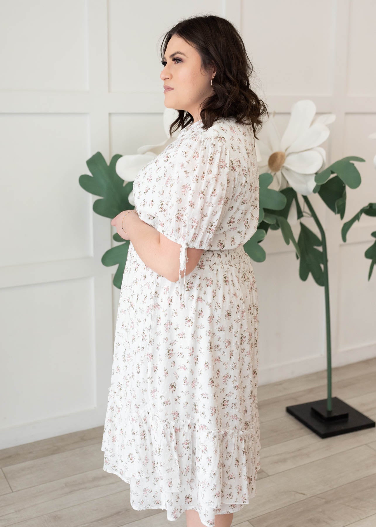 Side view of the ivory swiss dot floral dress