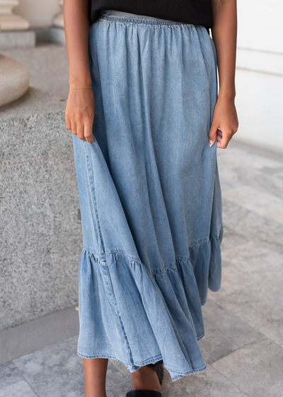 Front view of the the denim tiered skirt