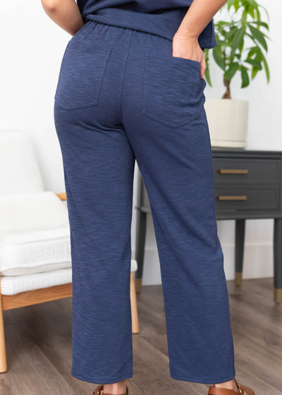 Back view of the navy knit pants