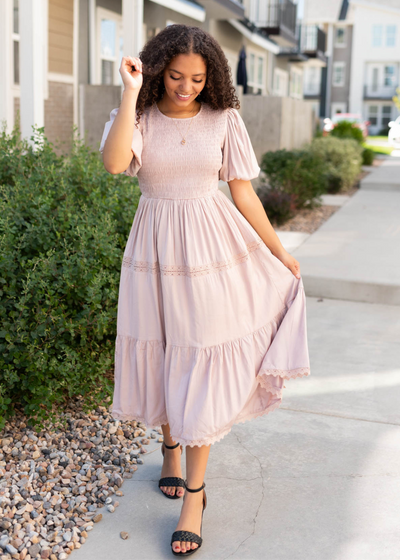 Blush dress with lace on the skirt