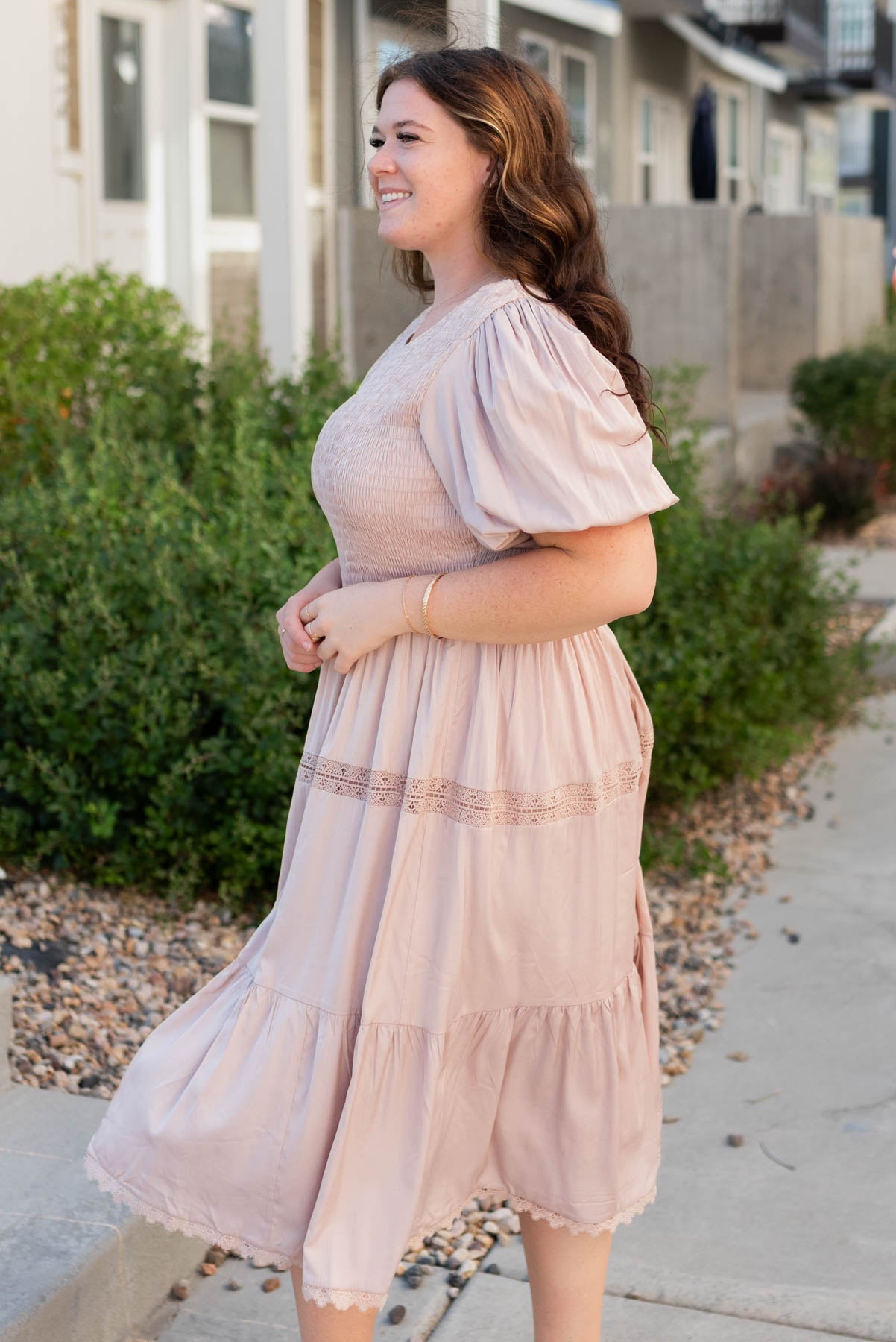 Side view of the blush dress in plus size