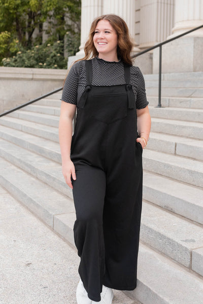 Black textured overalls with tie straps