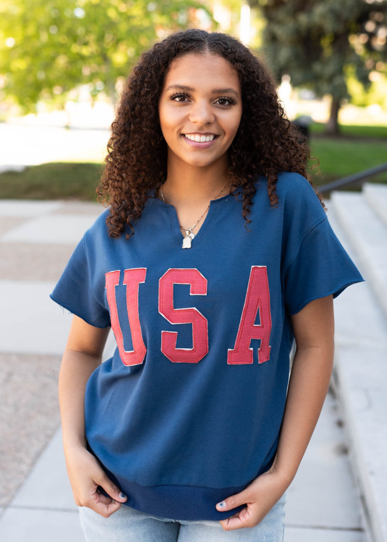 Short sleeve navy USA top with cut in the neckline