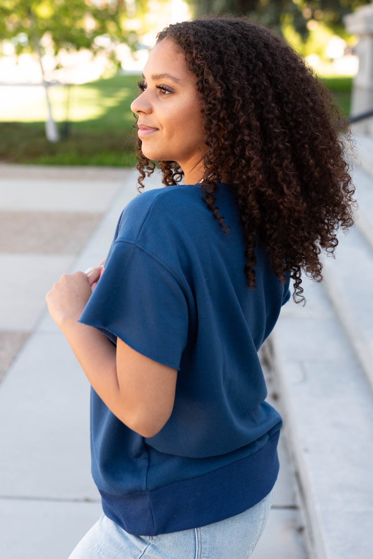 Side view of the navy USA top