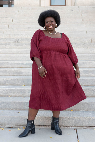 Plus size burgundy textured dress with short sleeves