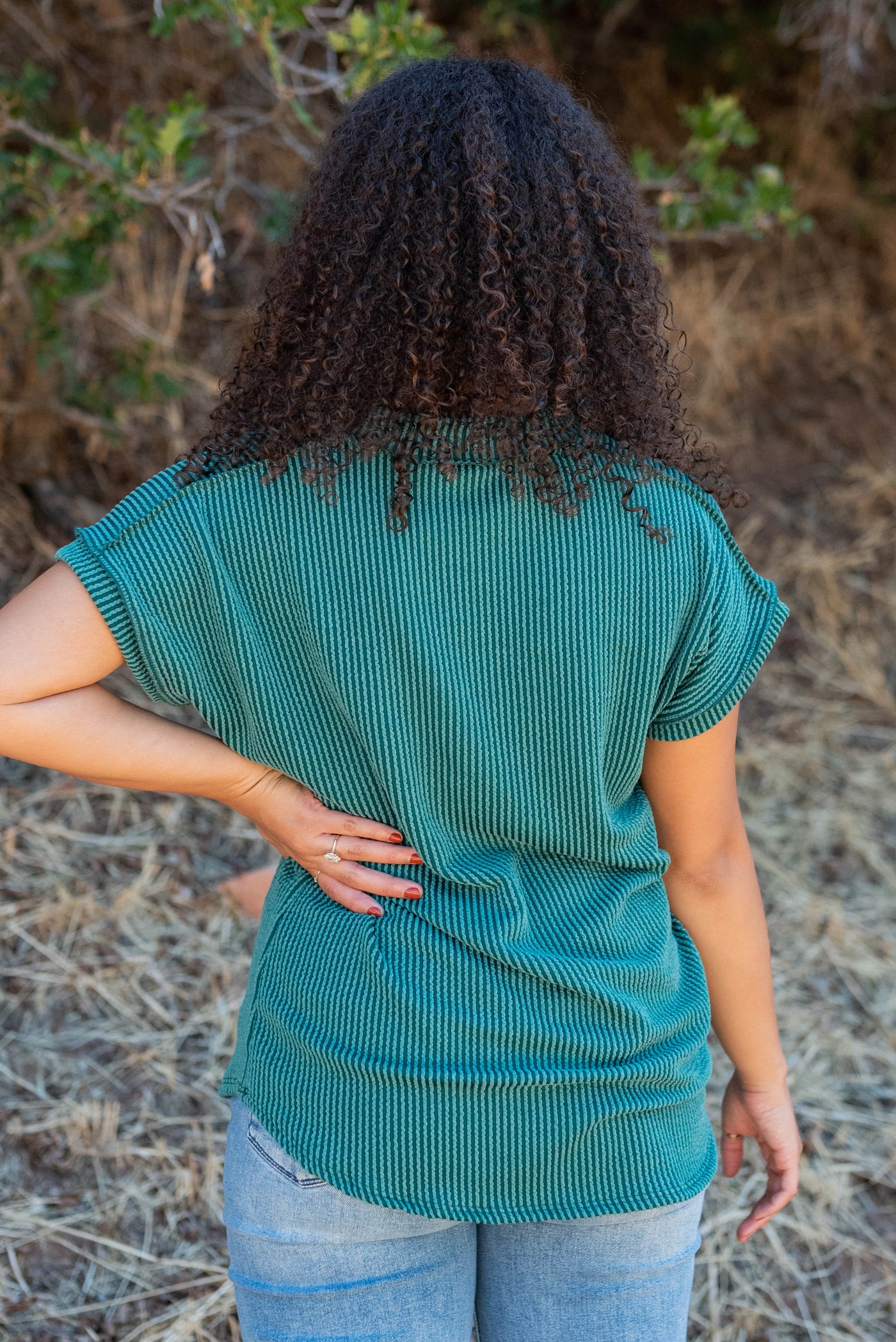 Back view of the hunter green ribbed top