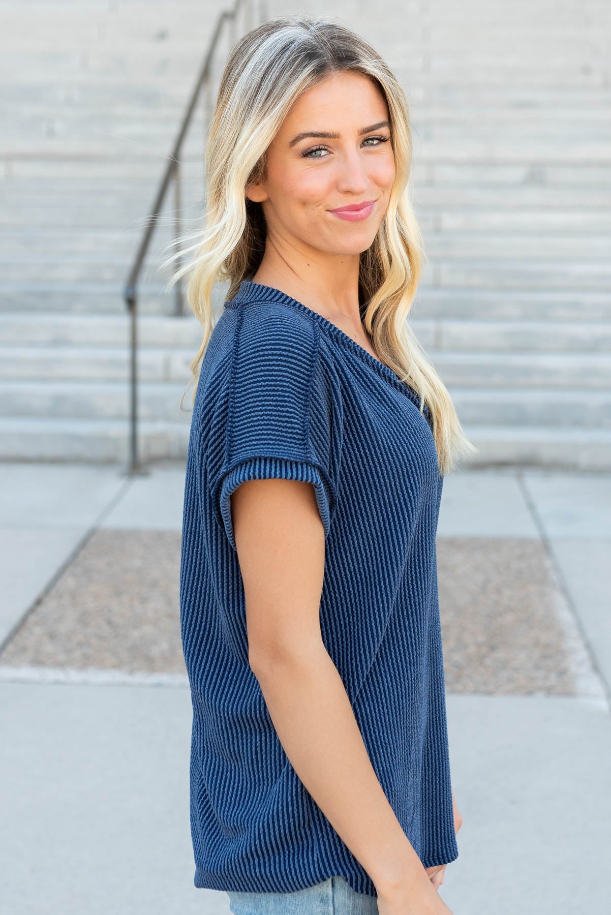 Side view of the navy ribbed top