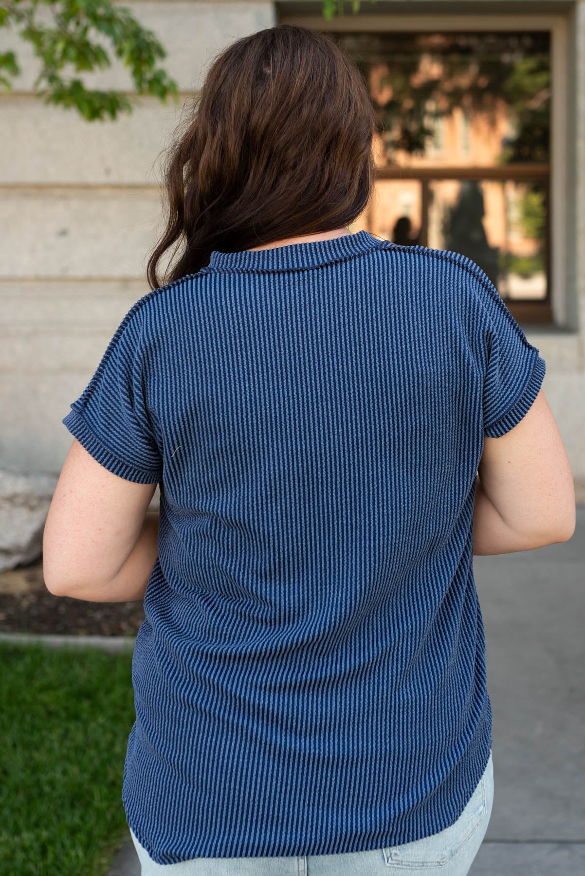 Back view of the plus size navy ribbed top
