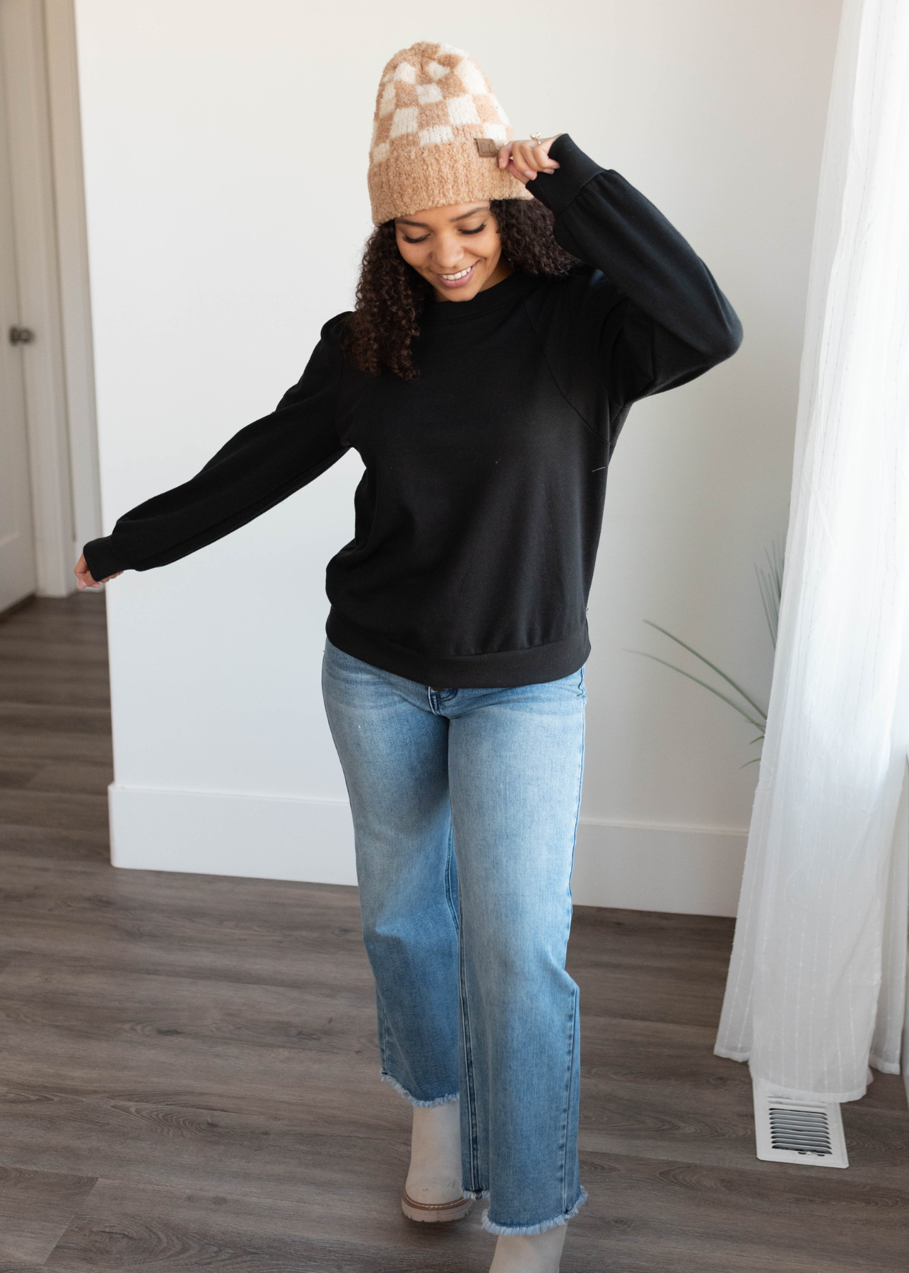 Black long sleeve top with puff sleeves