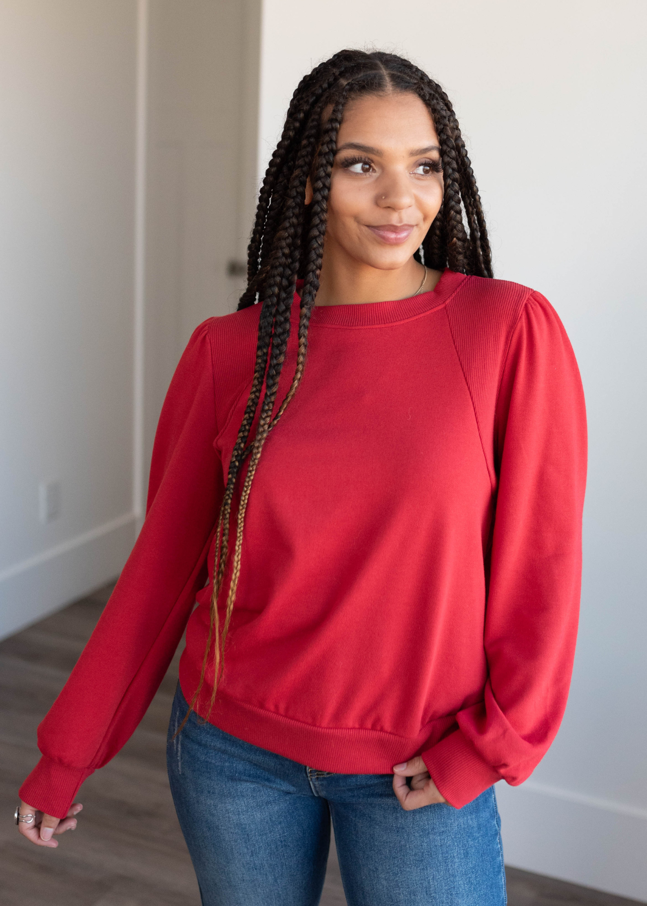 Red pullover with long sleeves