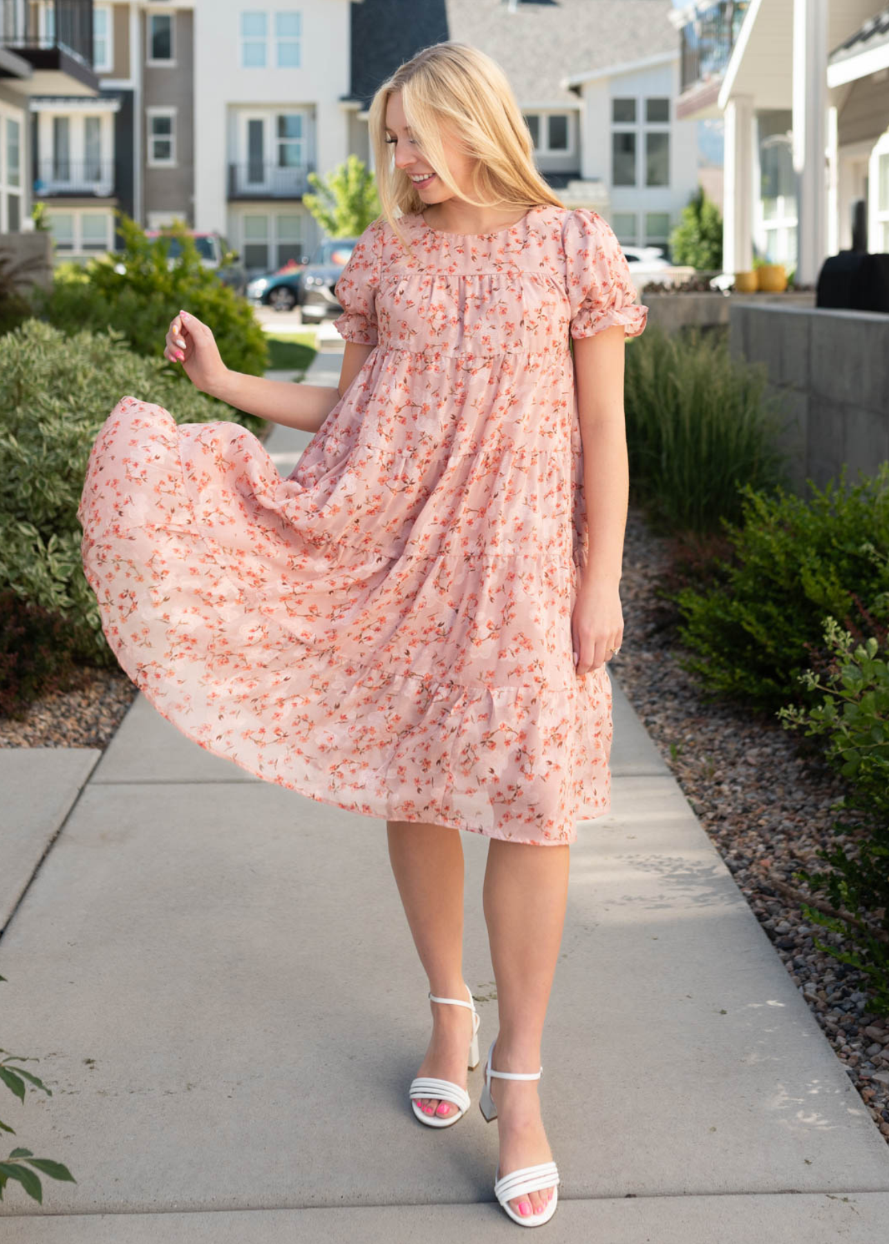 Tiered pink floral dress with short sleeves