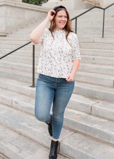 Plus size ivory floral top with high neck