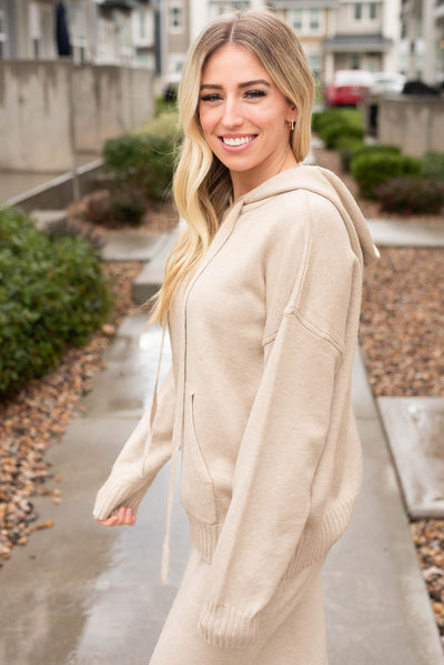 Side view of the taupe sweater