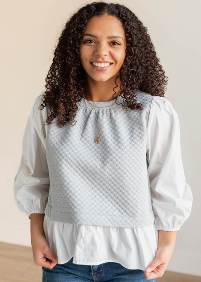 Heather greay blouse with ruffle hem