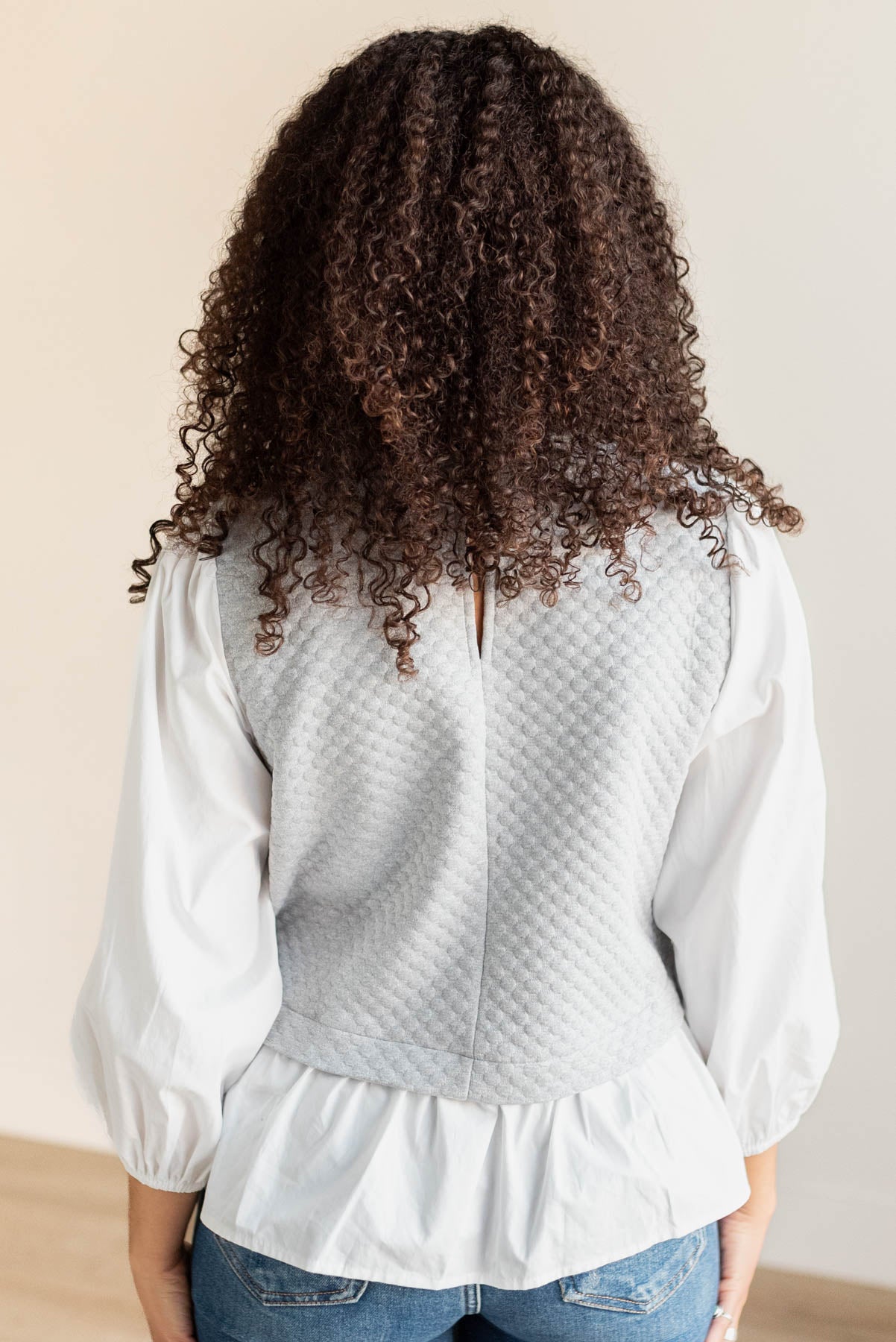 Back view of the heather grey blouse