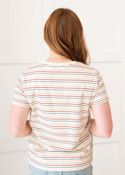 Backview of the ivory multi stripe top