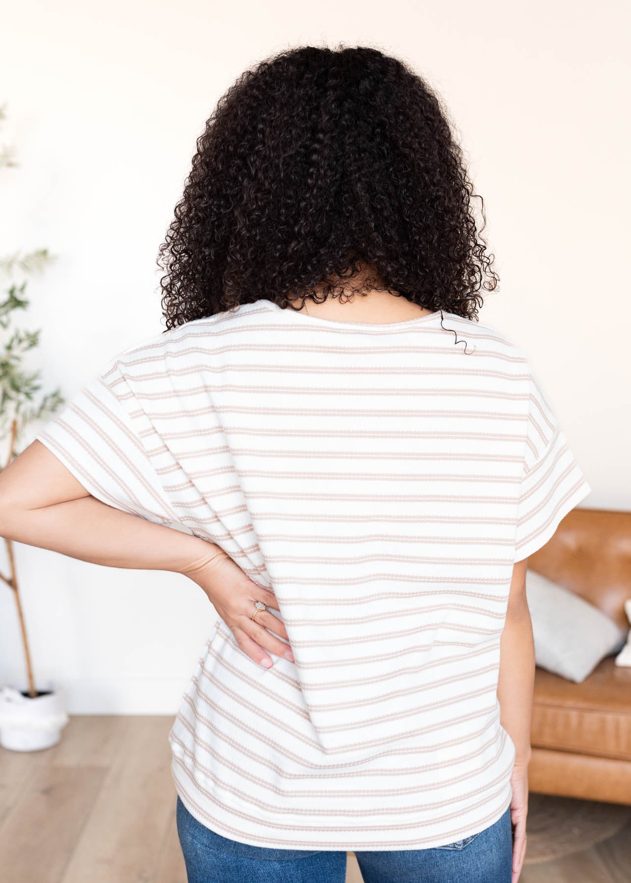 Back view of the taupe stripe top