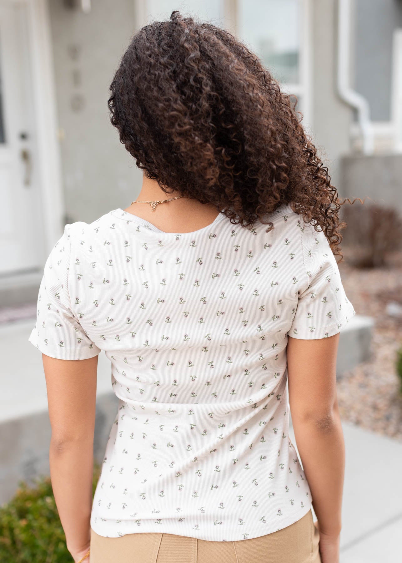 Back view of the ivory sage floral top