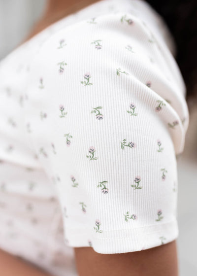 Close up of the sleeve and fabric on the ivory sage floral top